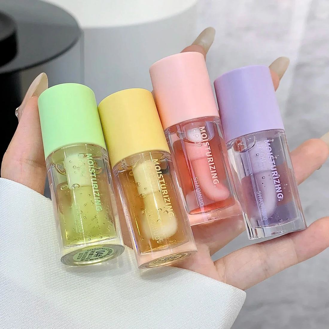 Clear glossy lip oil product view